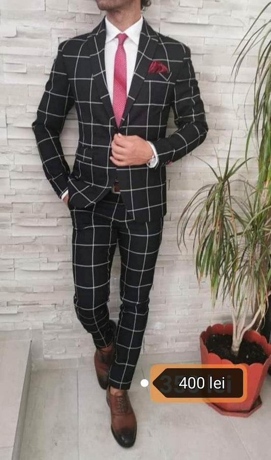 Costum barbat, negru in carouri gri (sacou si pantalon).